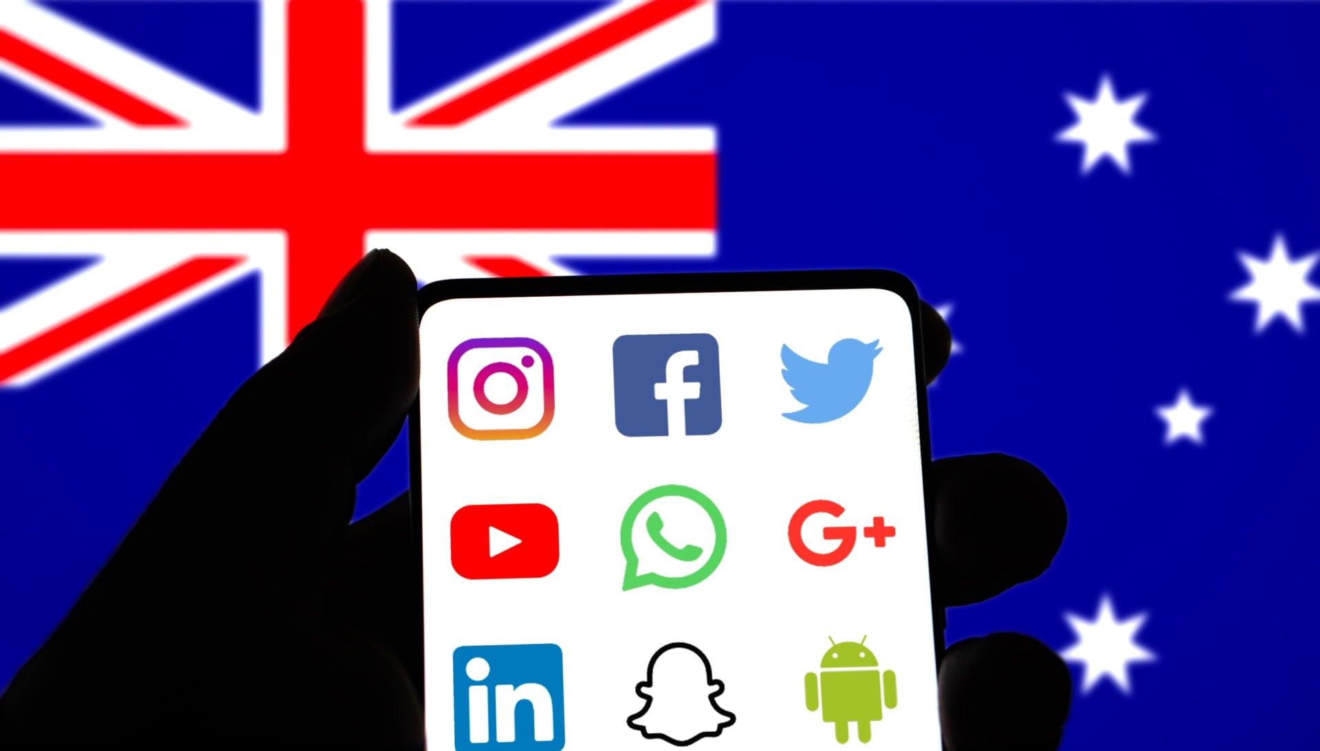Social media smartphone icons against an Australian flag