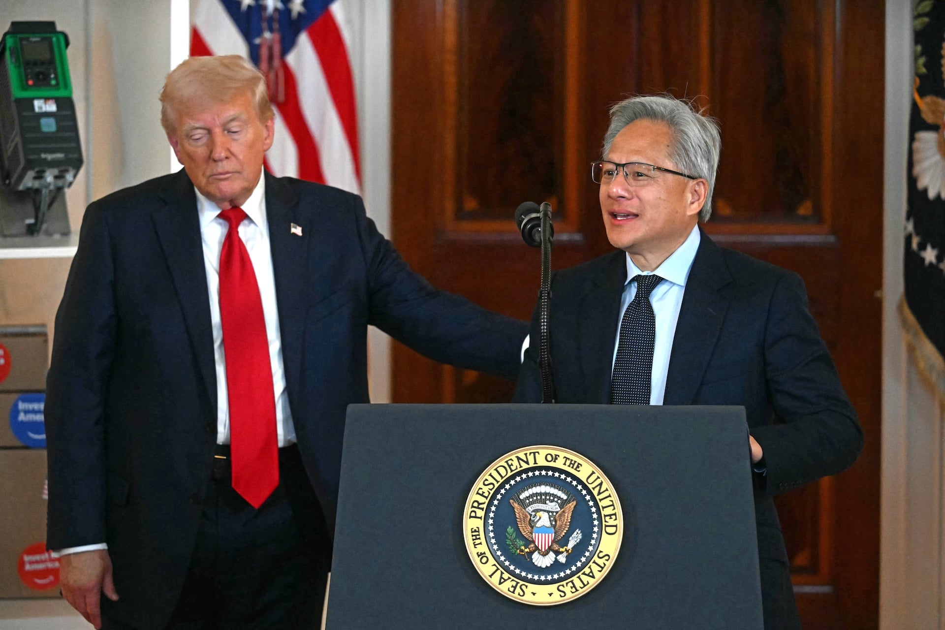Nvidia CEO Jensen Huang (R) speaks alongside US President Donald Trump at the White House in Washington, DC, on April 30, 2025.